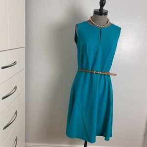 Lovely turquoise color Calvin Klein dress. New without tag. Classical style.